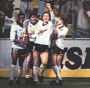 The Strikers celebrate a goal.